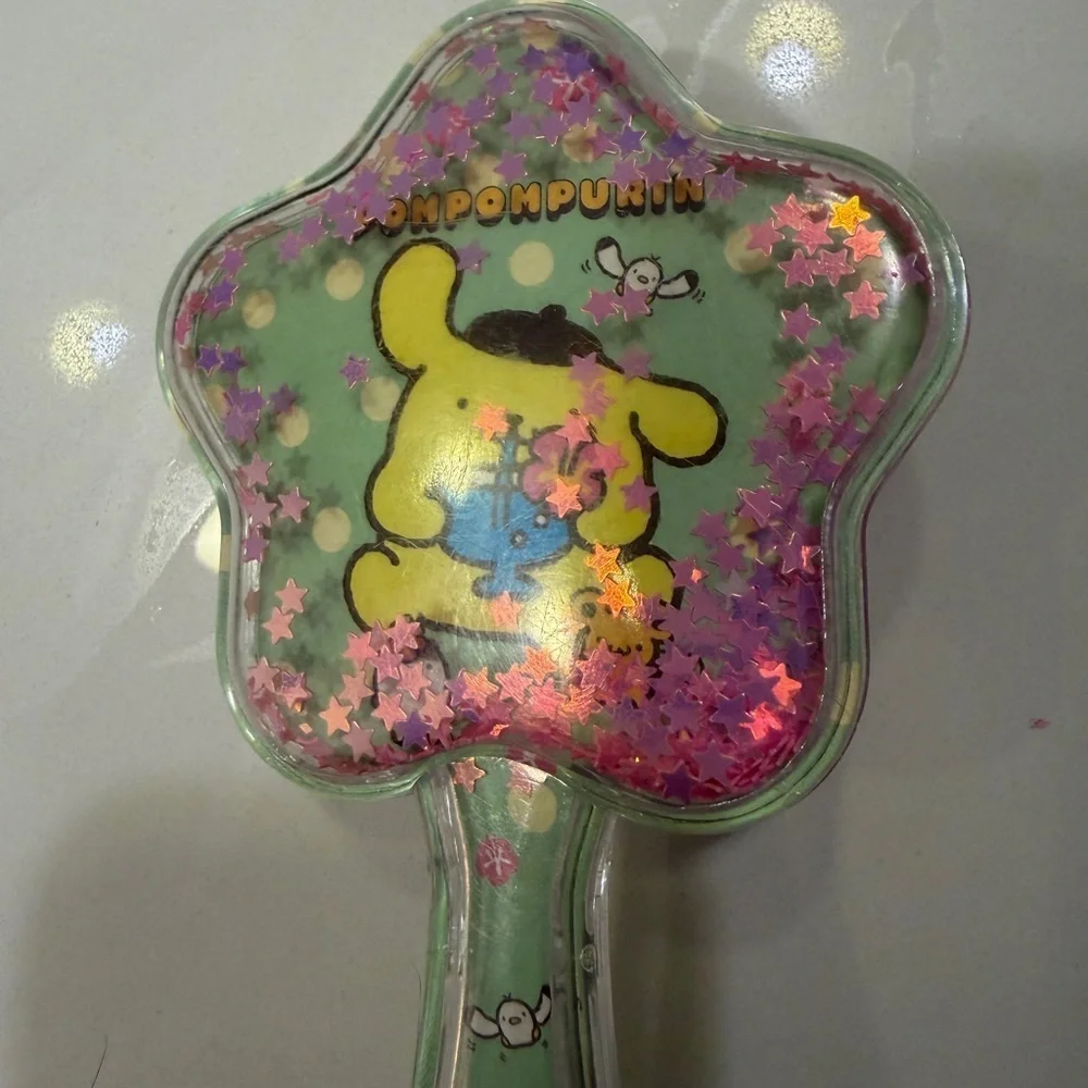 Sanrio Star-Shaped Hairbrush with Pompompurin and star glitter